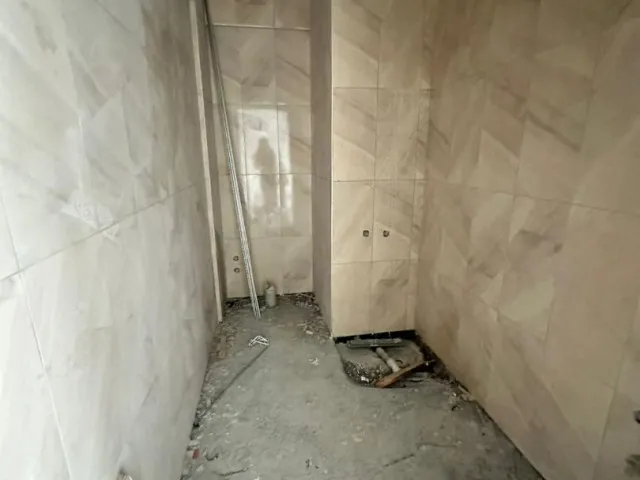 GÖNYELİ 'DE MERKEZİ KONUMLU KİRA GARANTİSİ BULUNAN 2+1 SIFIR DAİRE