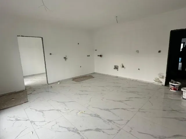 GÖNYELİ 'DE MERKEZİ KONUMLU KİRA GARANTİSİ BULUNAN 2+1 SIFIR DAİRE