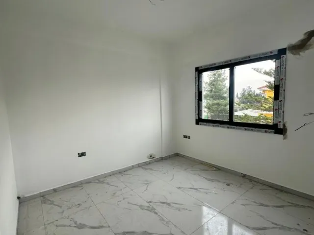 GÖNYELİ 'DE MERKEZİ KONUMLU KİRA GARANTİSİ BULUNAN 2+1 SIFIR DAİRE
